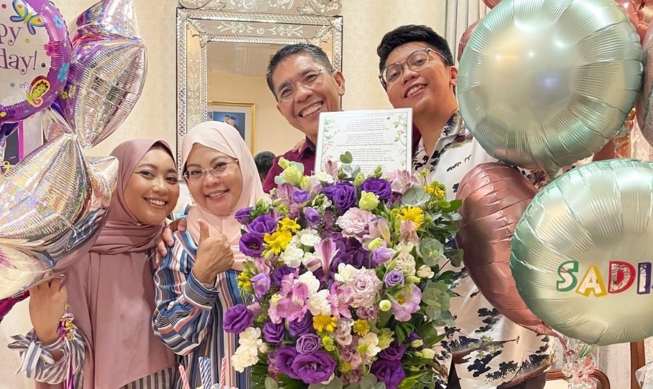 Dr Maliki had a conversational ability in his mother tongue until he became a father, when he and his wife Sadiah (centre) aimed to inspire a love for the language in his children Lidia (left) and Adli (right).