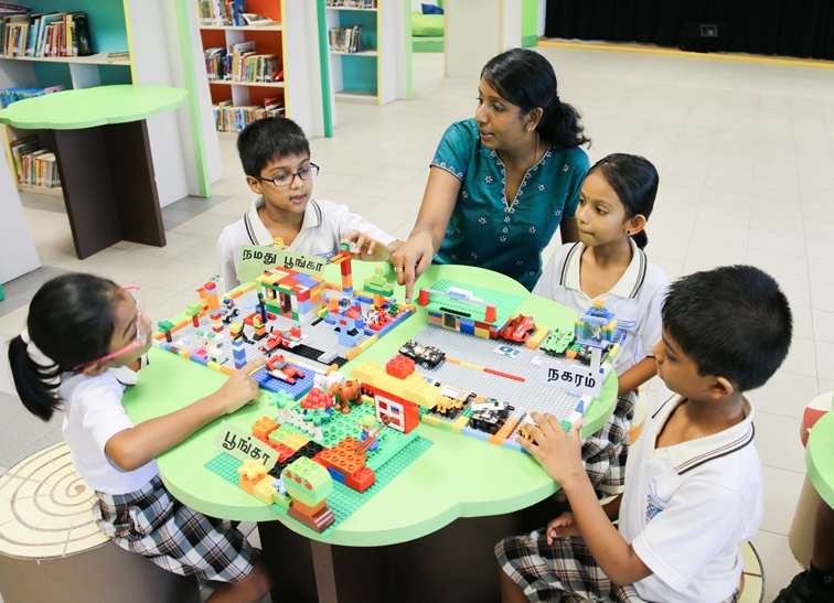 Ms Sivakami makes learning Tamil fun for her students by getting them to use LEGO bricks to create real-life models in order to link them with new learning experiences. 
