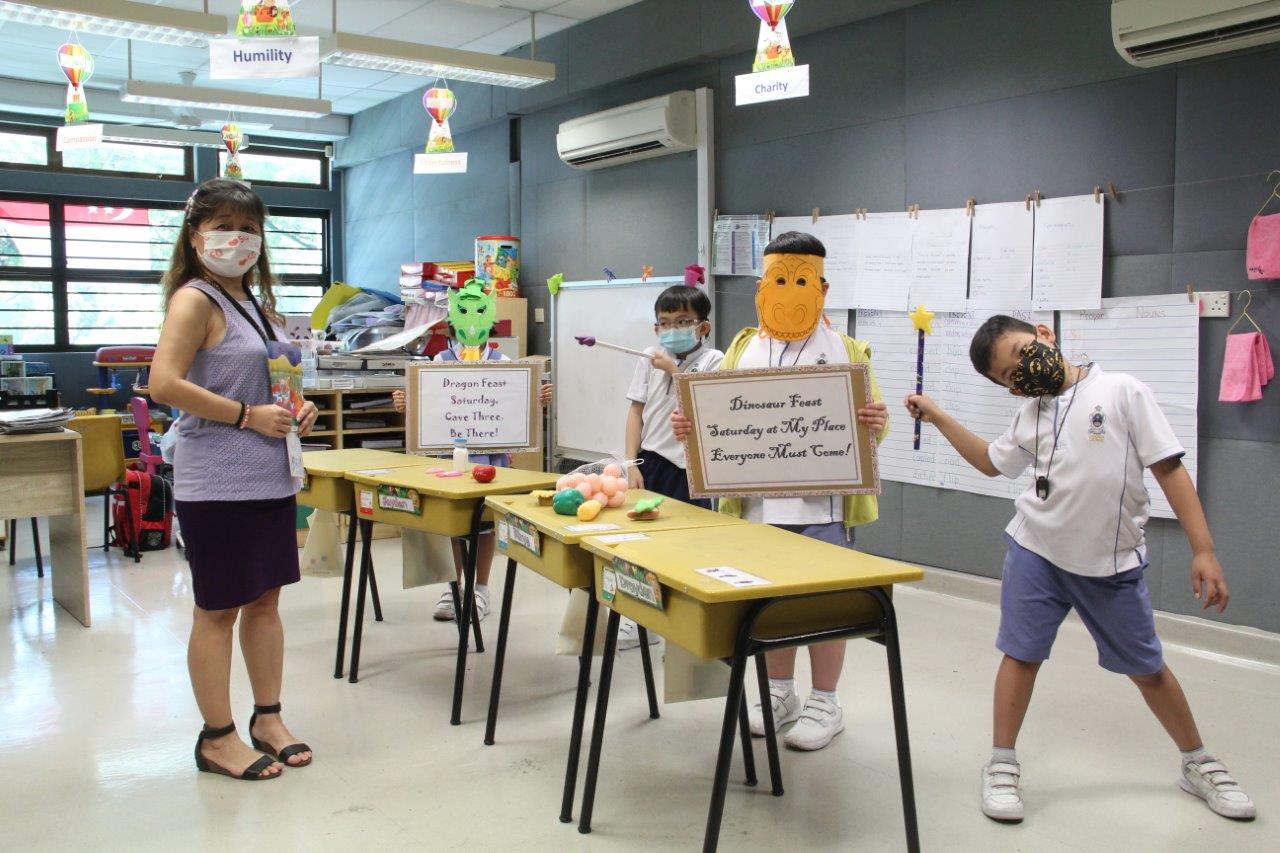 Mrs Alice Ng from Canossian School preparing her students for a role-playing activity. (Photo taken in accordance with COVID-19 Safe Management Measures.)