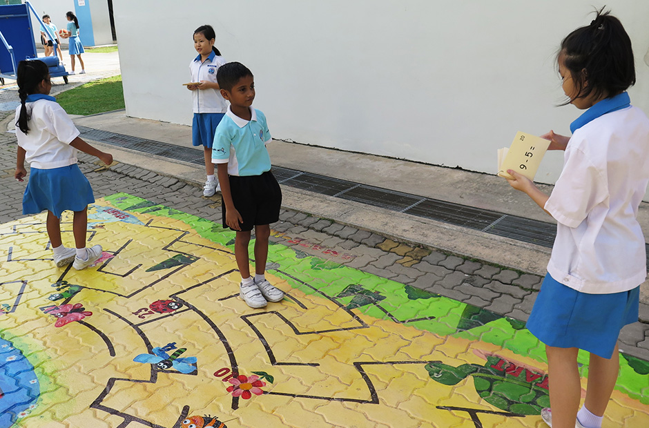 Students solve maths problems to progress in this game.

(Photo credit: Eunos Primary School)