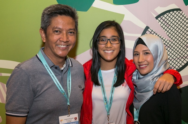 Mr Johari Bin Wahiad(left), wife (right) and daughter, Nikki Barista Karya (middle) at the Opening Ceremony of the 9th ASEAN Schools Games.