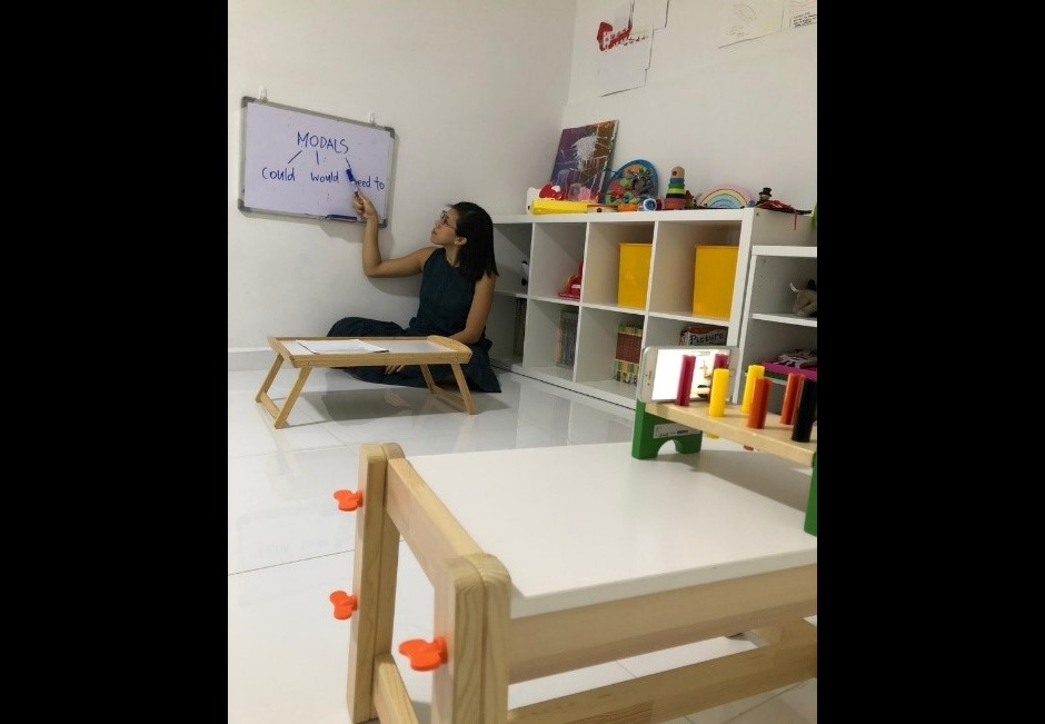 Ms Cheryl Ng, the Head of Department for English Language at Anglo-Chinese School (Junior), put together a makeshift stand that allowed her to record videos of her lessons with just a smartphone.