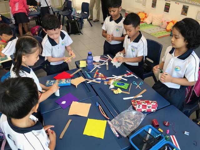 Students working on an art piece during their Programme for Active Learning activity. (Photo Credit: Punggol Cove Primary School)