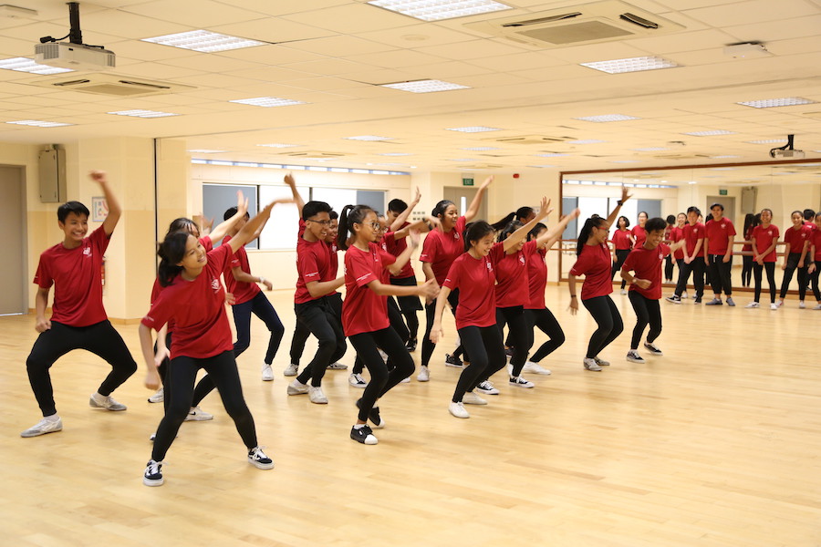 Tampines Secondary School’s Street Dance CCA members demonstrate their choreography ideas to their peers.