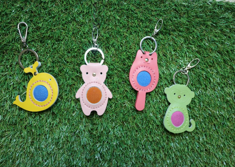 Samples of the key chains handmade by students of Lianhua Primary School for one of their community projects, ‘Personalised Love’. Many were pricked by the needles but none gave up and completed the craftwork with pride and joy.
 
(Photo credit: Lianhua Primary School)