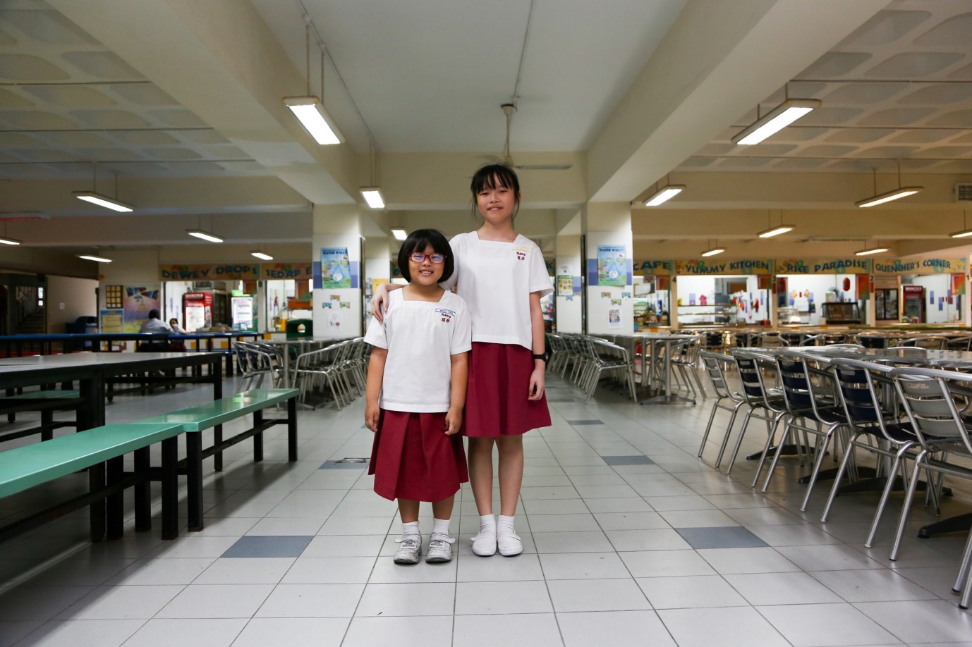 Miranda Tay (right) was a buddy to young Marcie Chew (left) during the younger girl’s her first days at Rulang Primary School.