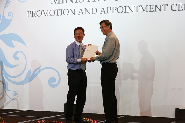 Mr Kenny Ong (second from left), 49, was promoted to Lead School Counsellor at the MOE Promotion and Appointment Ceremony 2014.