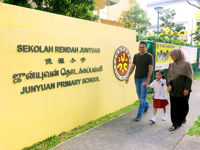 Mr Muchtar Abdul Karim and his wife, Mdm Yuslina Bte Mohamed Salleh, believe they have chosen the right school for their daughter, Syafiah. 