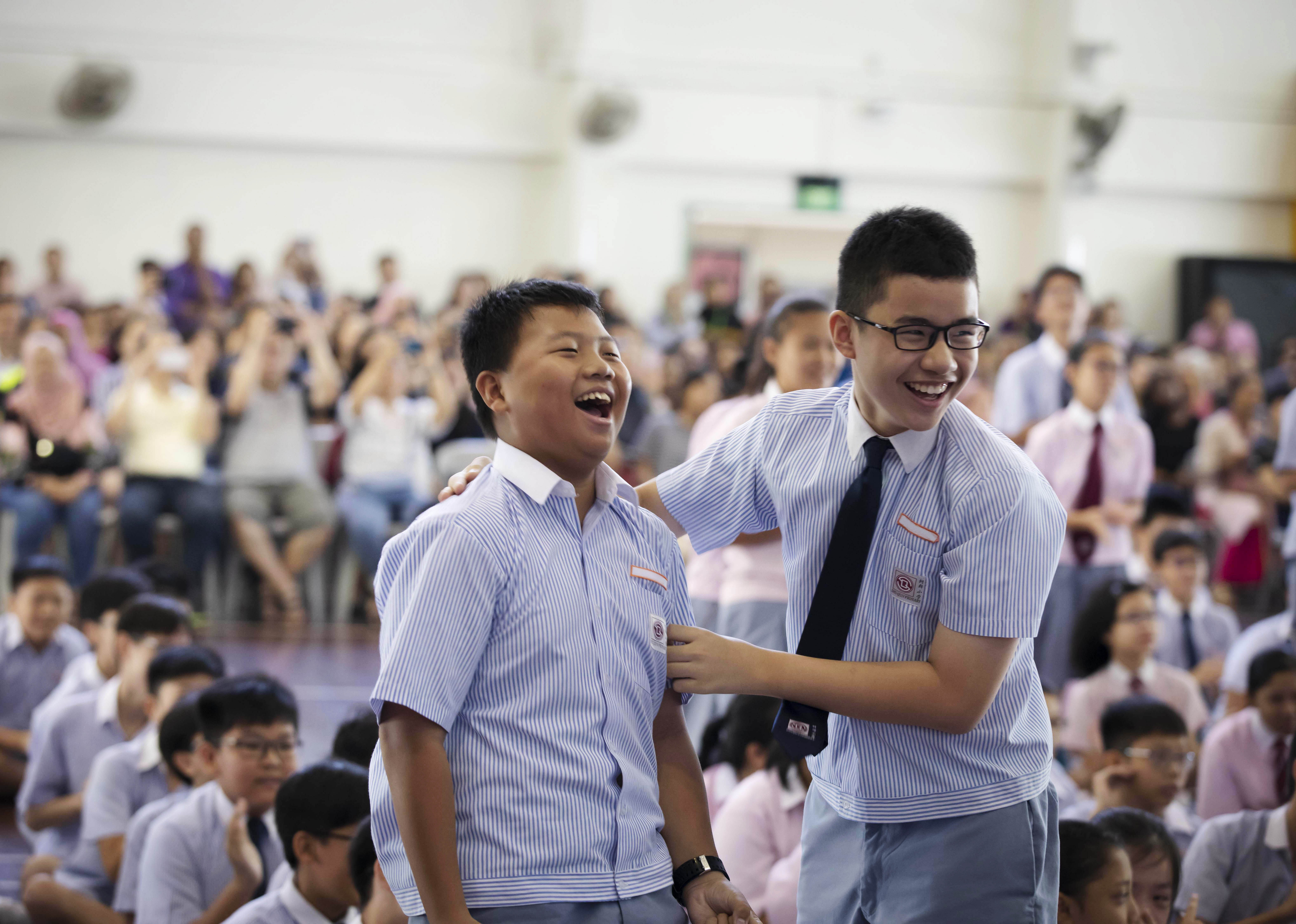 Stock Image: A group of students receiving their PSLE results  