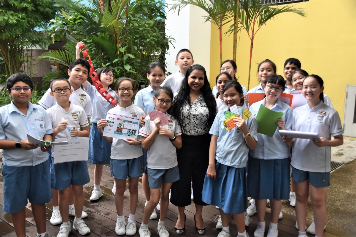 Shanthi (middle) with her students, after a fun comprehension lesson. 
(Photo was taken before COVID-19)