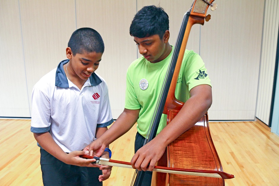 Muhammad Shukoor, a Secondary Four student who developed his love for music after joining the CCA, shares his passion. (Photo: Yuhua Secondary School)
