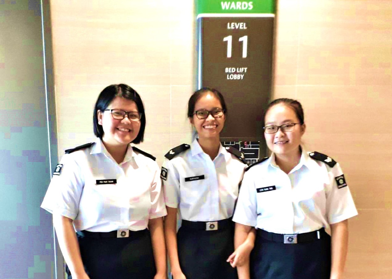 Nurfaizah (centre) and her fellow St John Brigade (SJB) mates during their MOH Hospital Attachment Programme at Ng Teng Fong Hospital in 2017. She credits Mr Lui for encouraging her to pursue her passion for nursing.