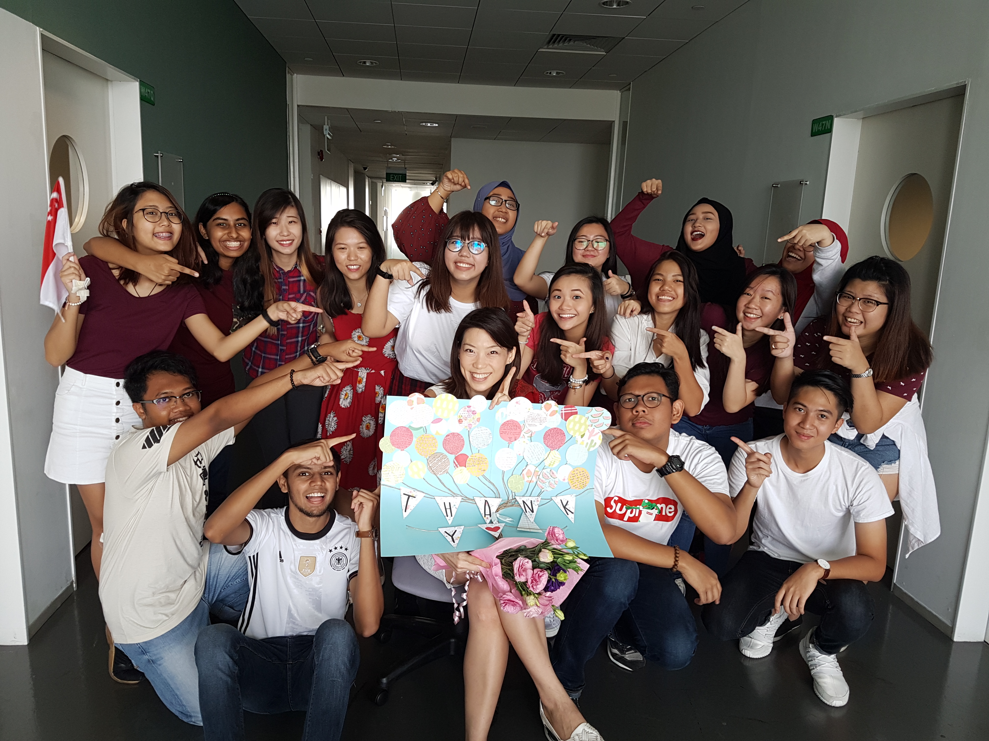 Teeny Teh (middle, seated) with her students who put up a surprise performance for her at the end of the module. (Photo taken before COVID-19.)