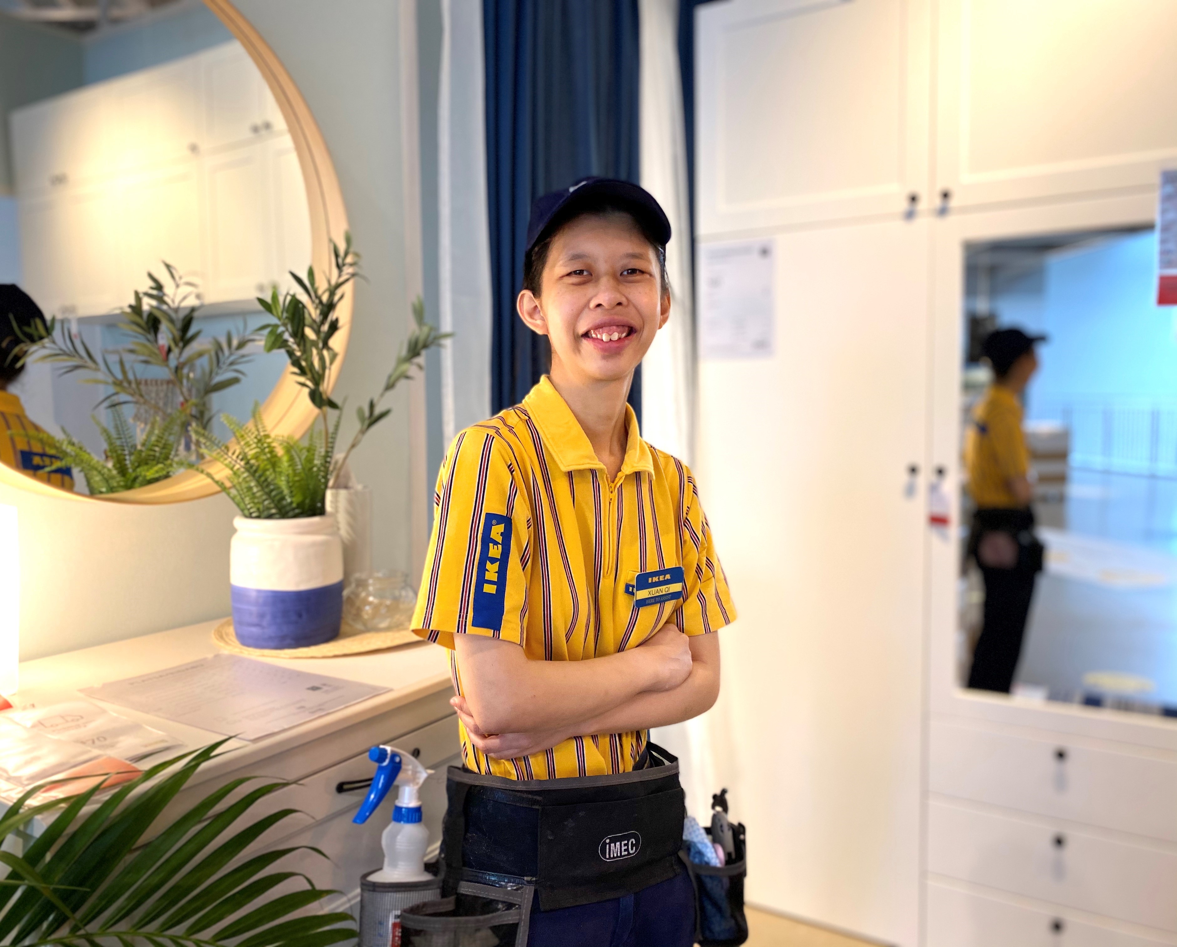 Xuan Qi works as a busser at IKEA Tampines Restaurant.