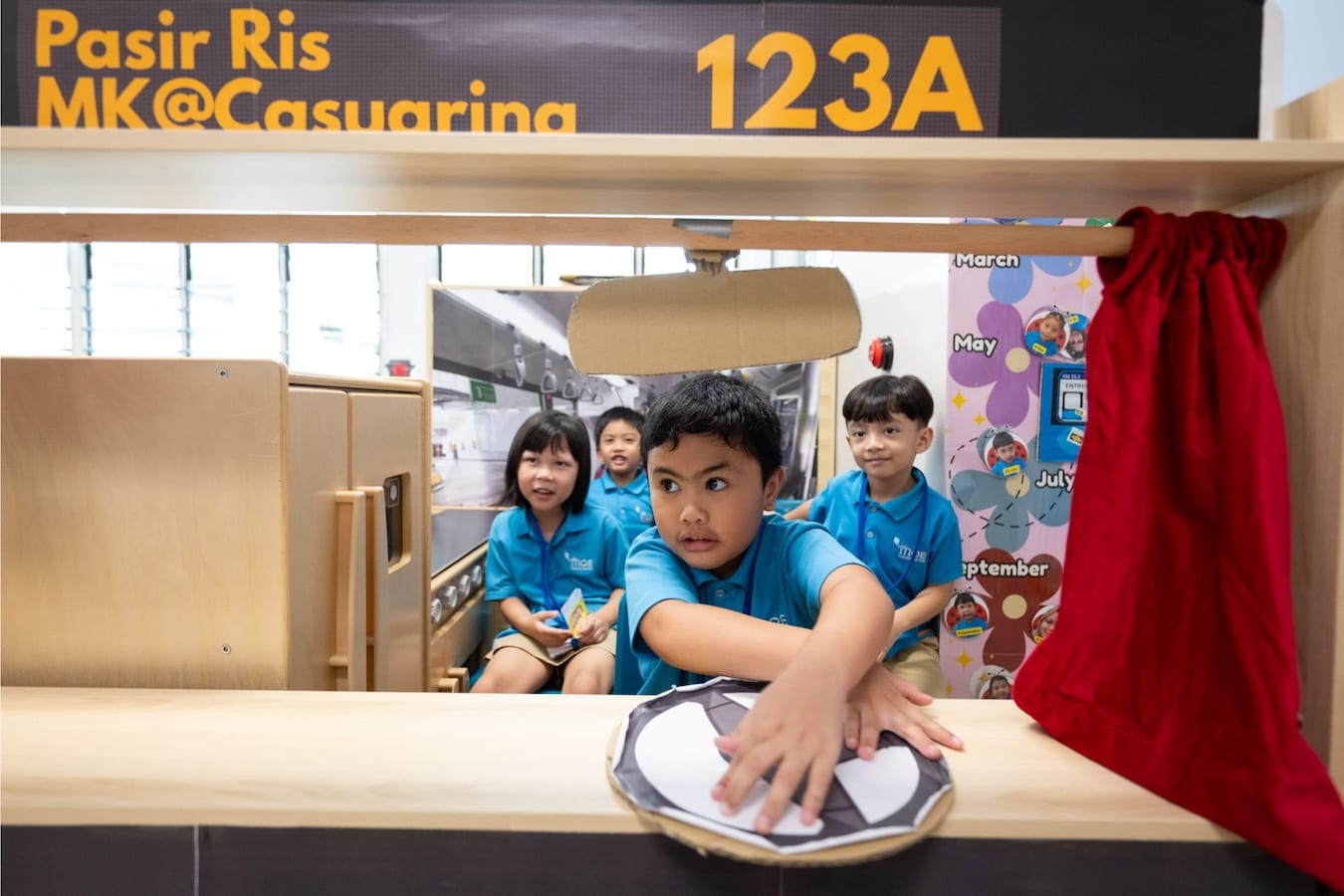 a child drives the imaginary bus